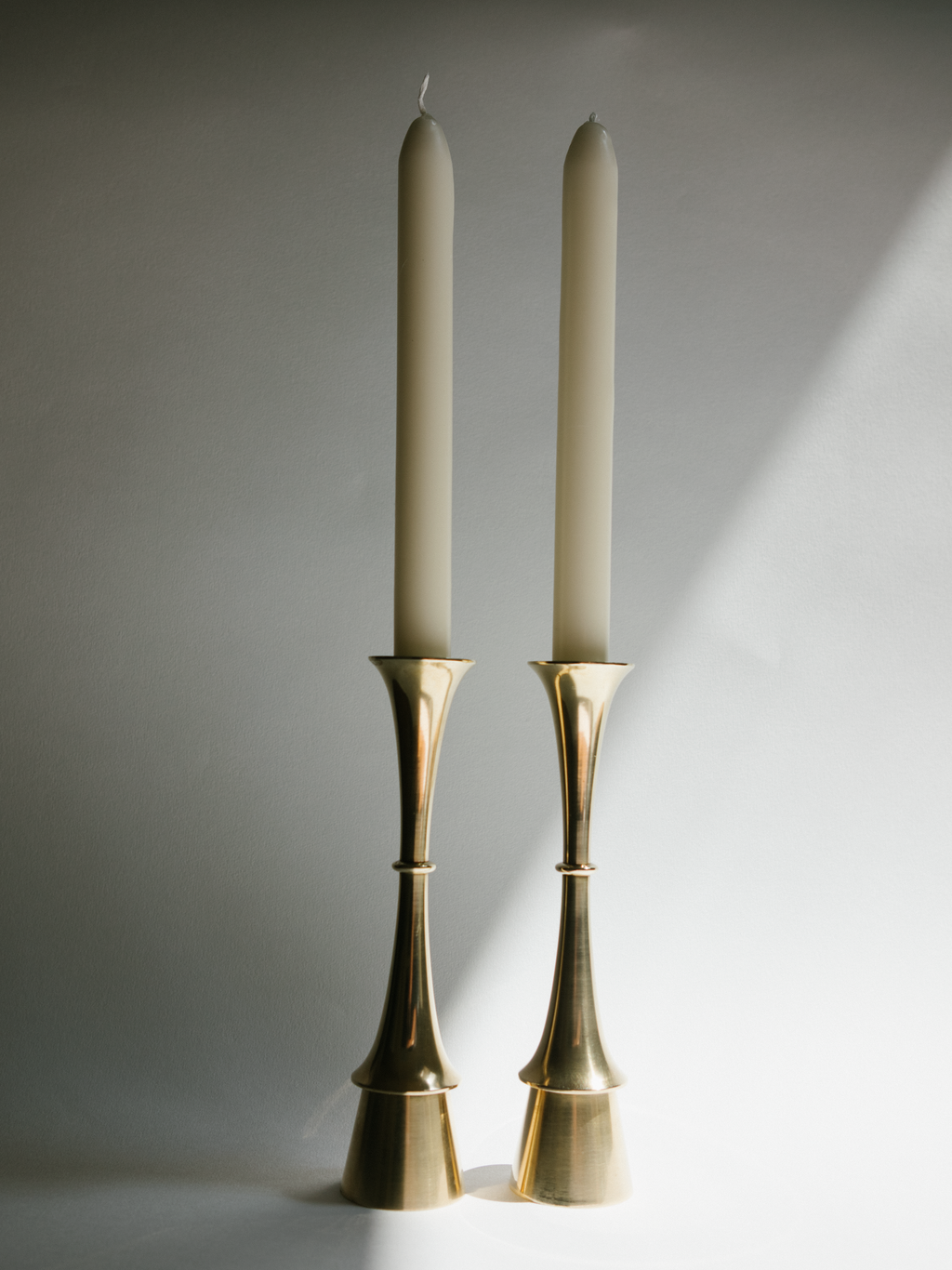 Pair of Fluid Form Danish Modern Solid Brass Candlesticks
