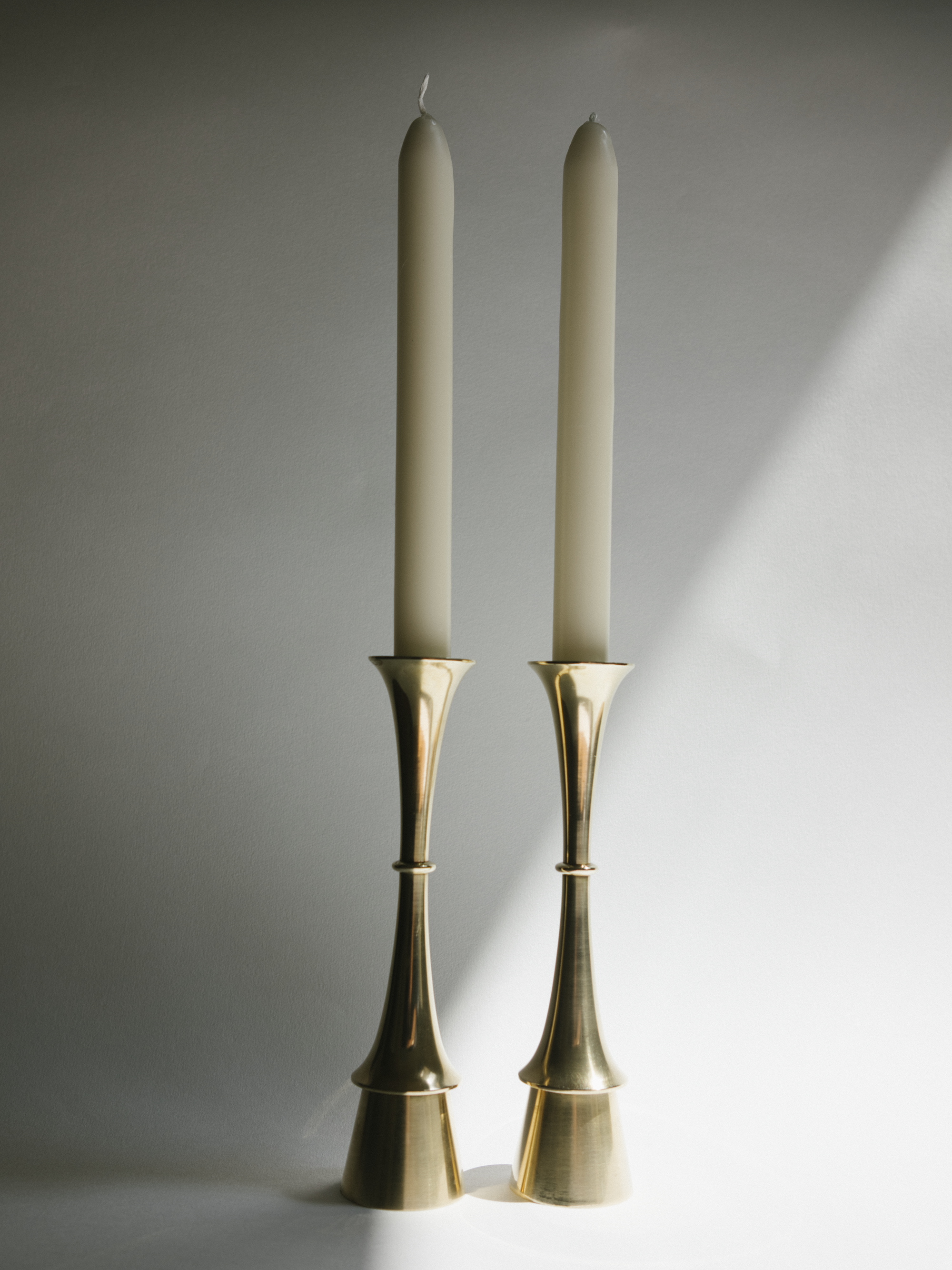 Pair of Fluid Form Danish Modern Solid Brass Candlesticks