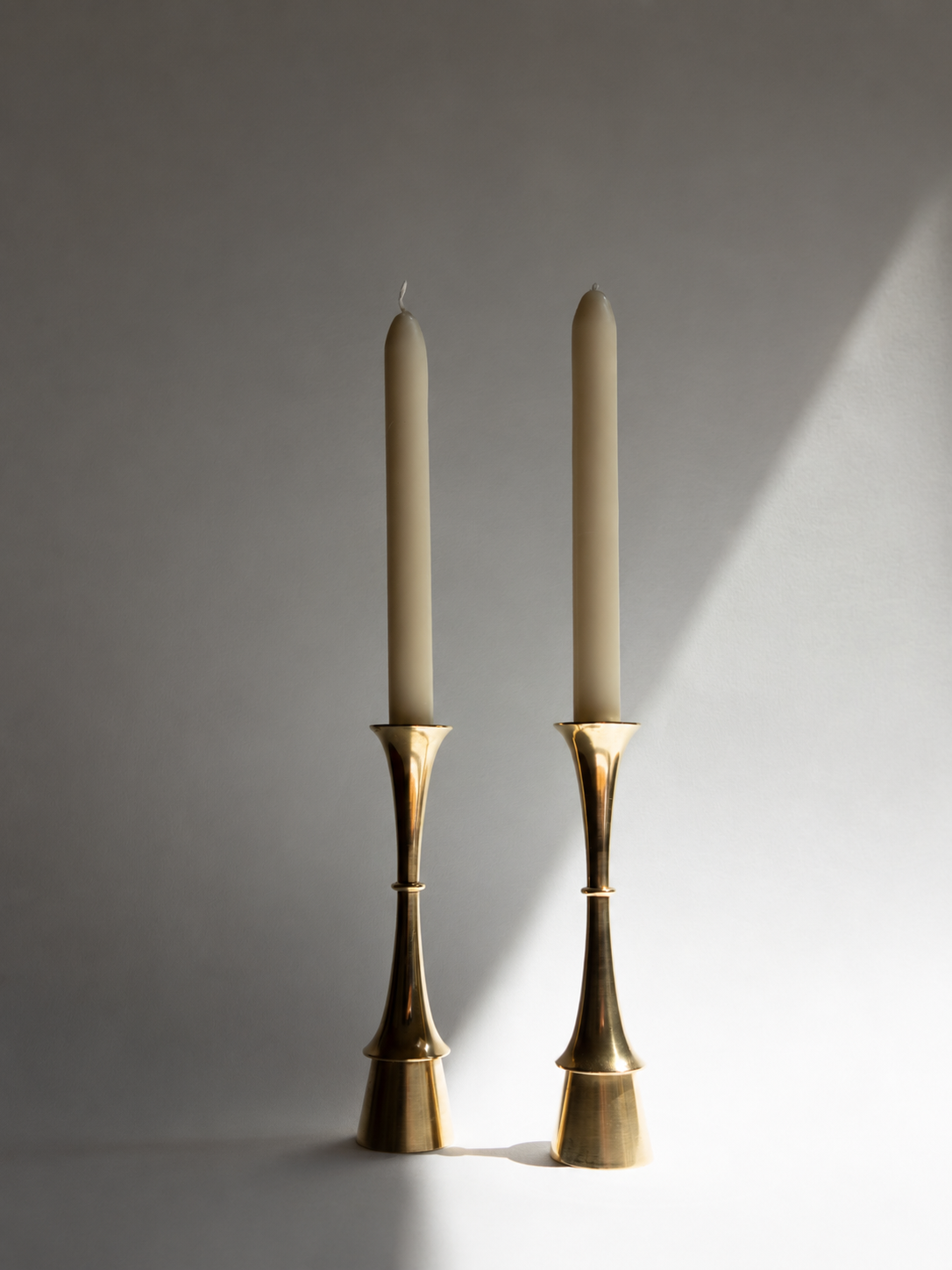 Pair of Fluid Form Danish Modern Solid Brass Candlesticks