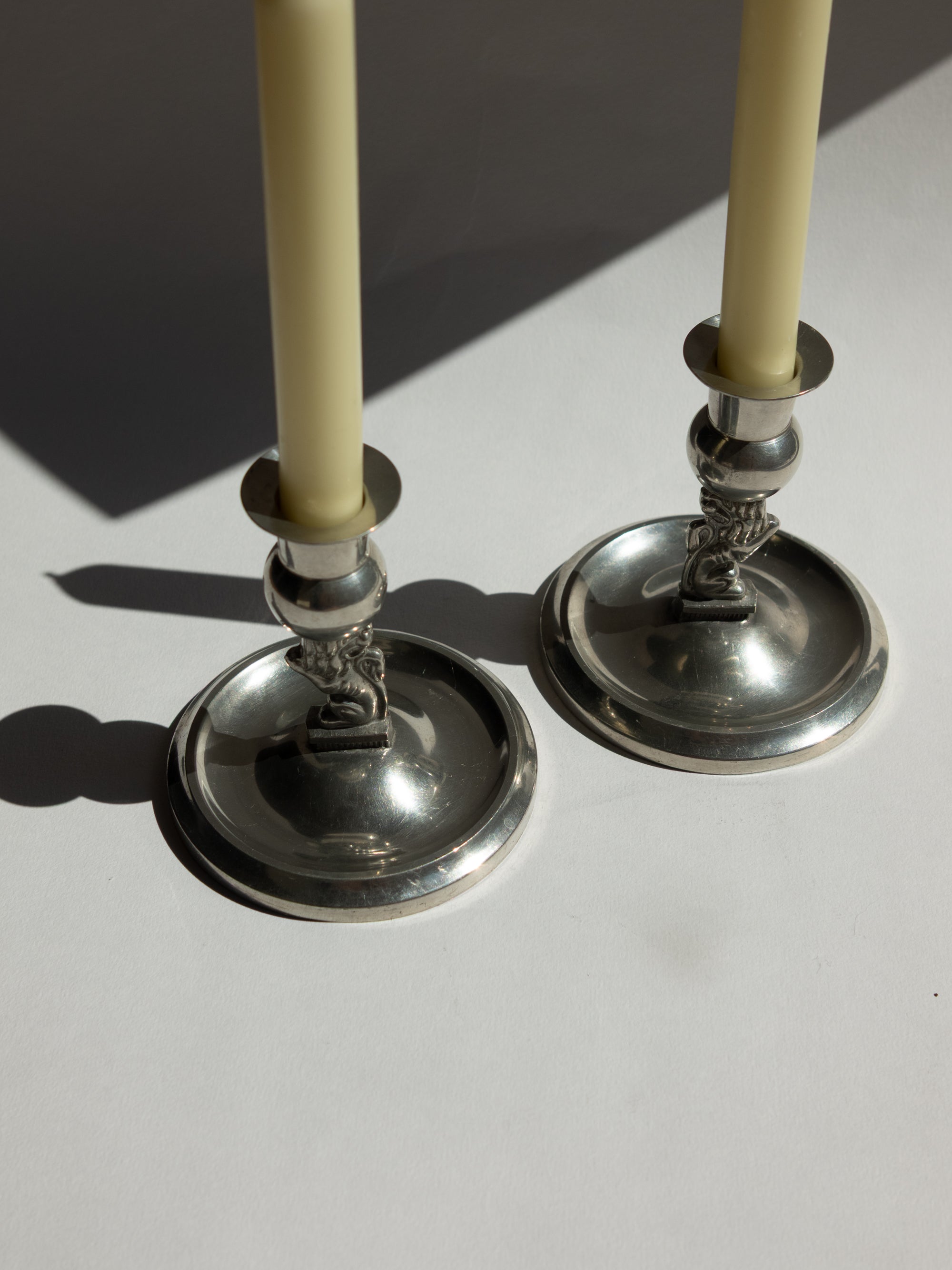 Pair of Swedish Grace Pewter Lion Candlesticks by Eskilstuna Metallindustri (EM) | Svenskt Tenn