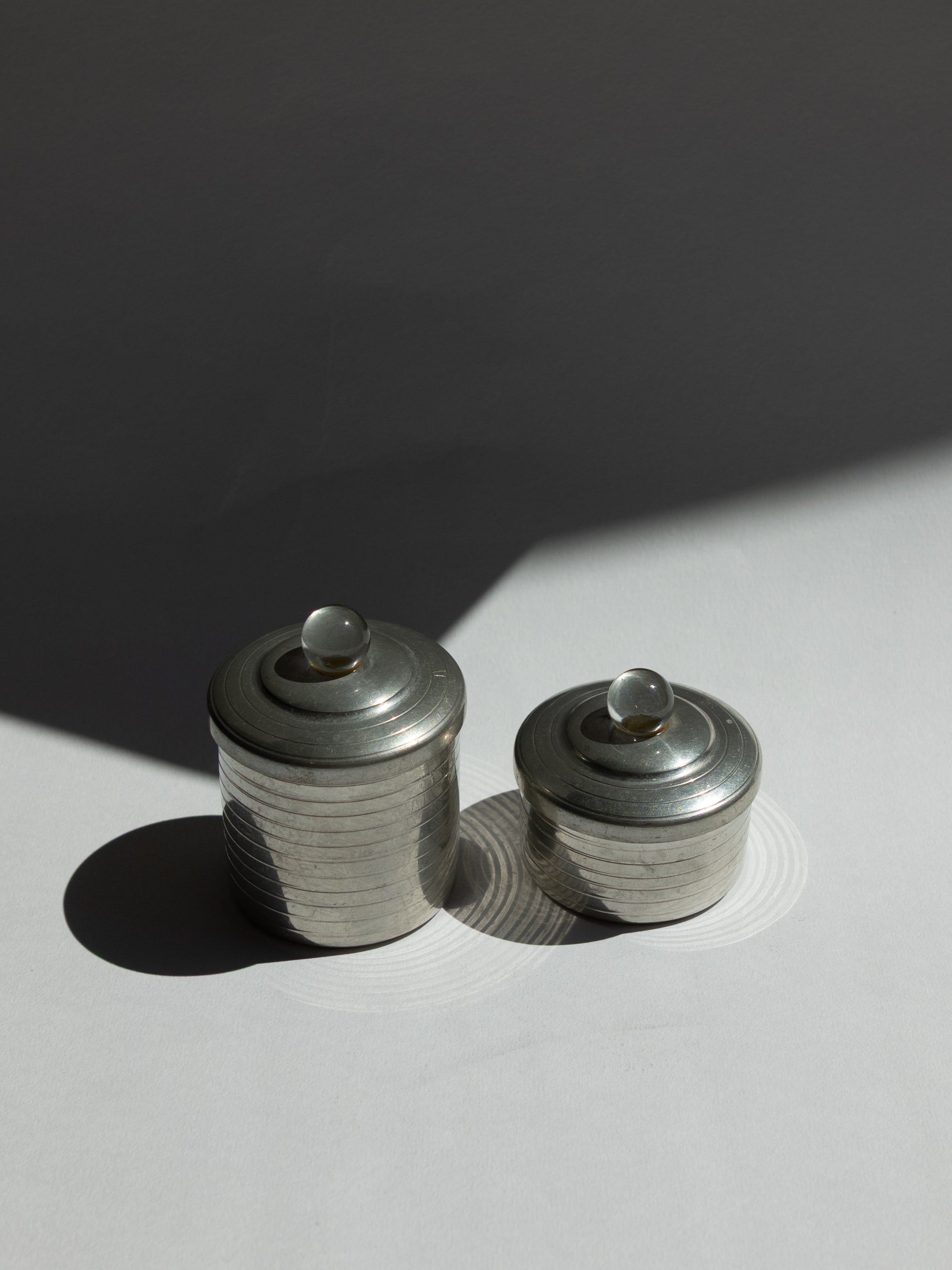 Pair of French Art Deco Modernist Pewter Vanity Pots with Glass Orb Finials