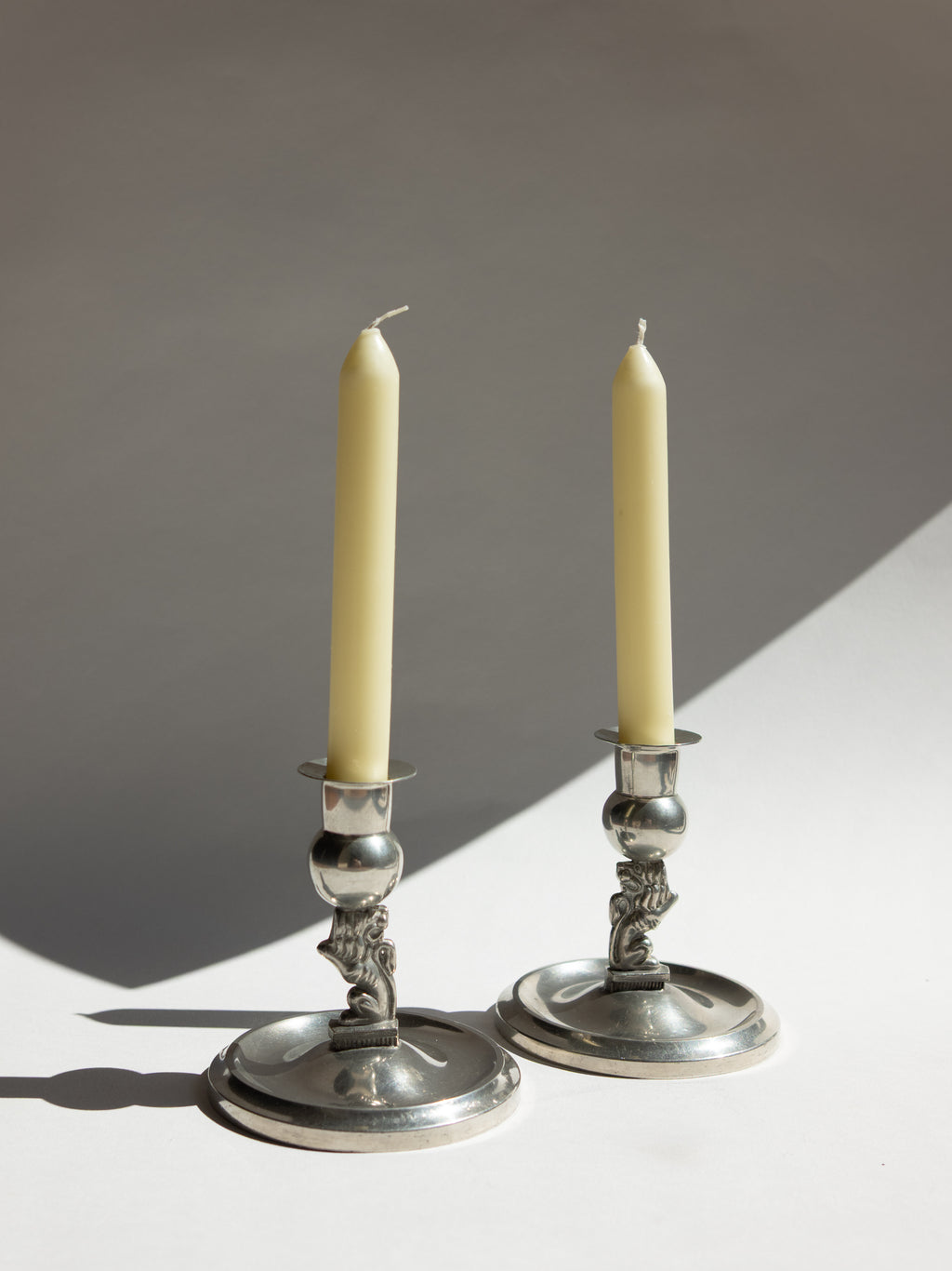 Pair of Swedish Grace Pewter Lion Candlesticks by Eskilstuna Metallindustri (EM) | Svenskt Tenn
