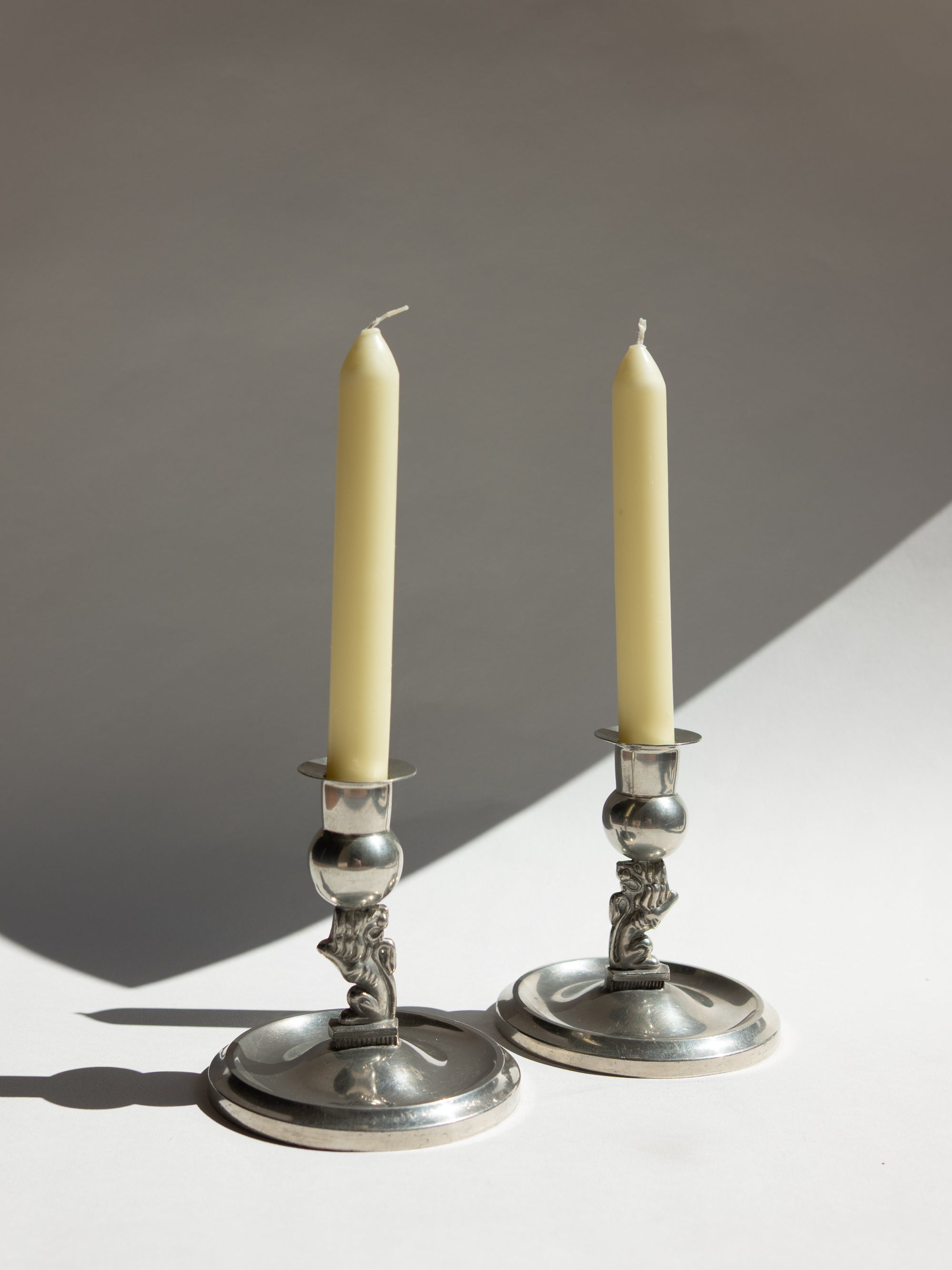 Pair of Swedish Grace Pewter Lion Candlesticks by Eskilstuna Metallindustri (EM) | Svenskt Tenn