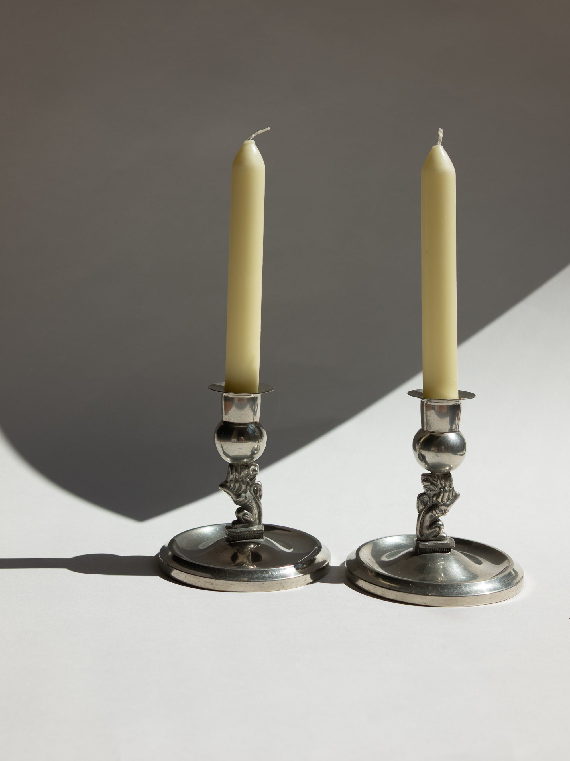Pair of Swedish Grace Pewter Lion Candlesticks by Eskilstuna Metallindustri (EM) | Svenskt Tenn