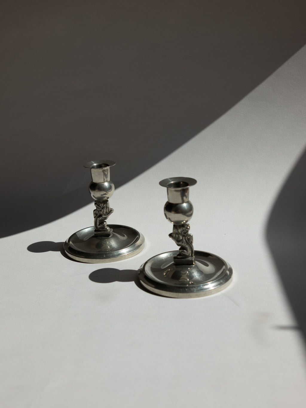 Pair of Swedish Grace Pewter Lion Candlesticks by Eskilstuna Metallindustri (EM) | Svenskt Tenn