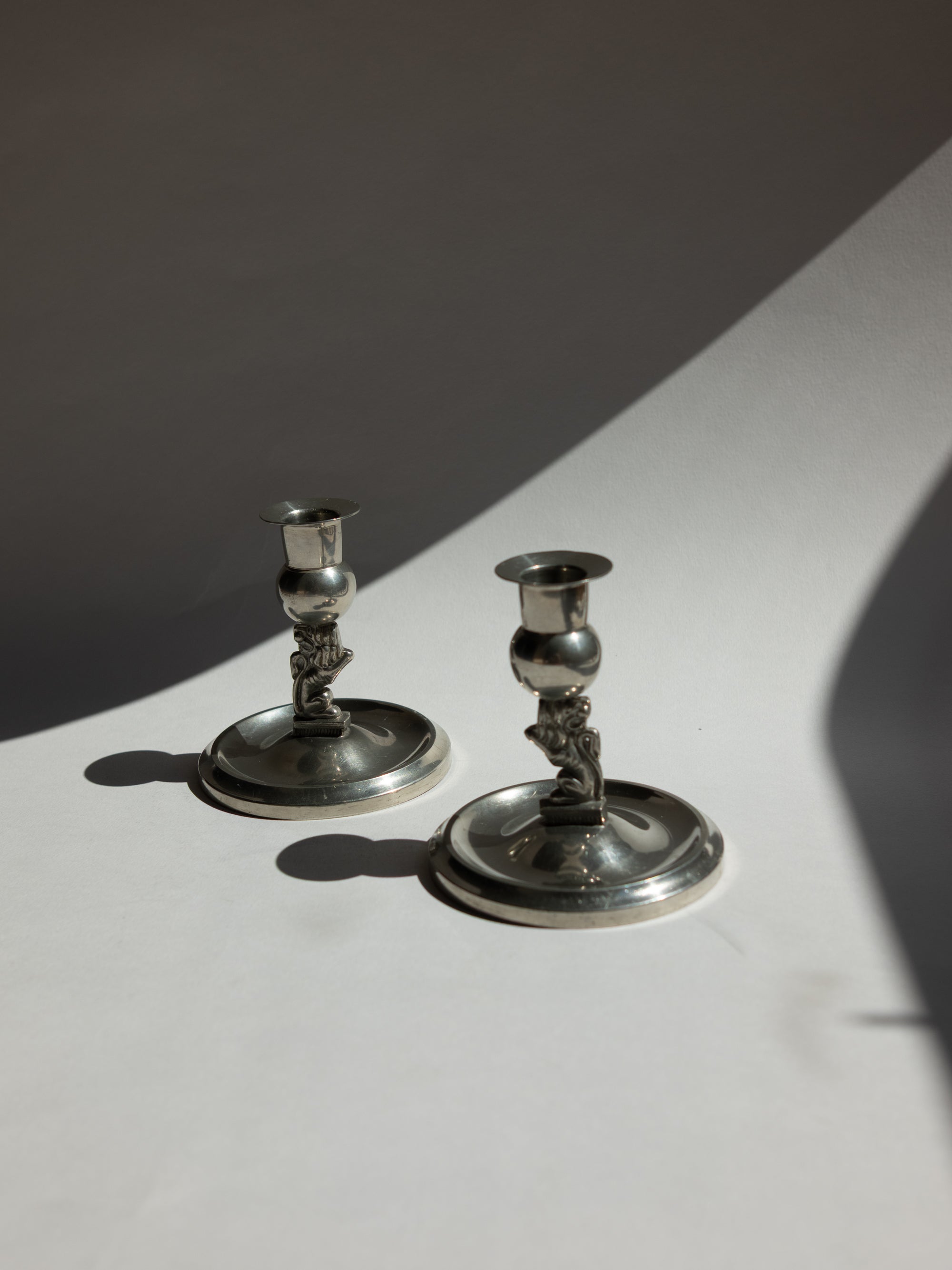 Pair of Swedish Grace Pewter Lion Candlesticks by Eskilstuna Metallindustri (EM) | Svenskt Tenn