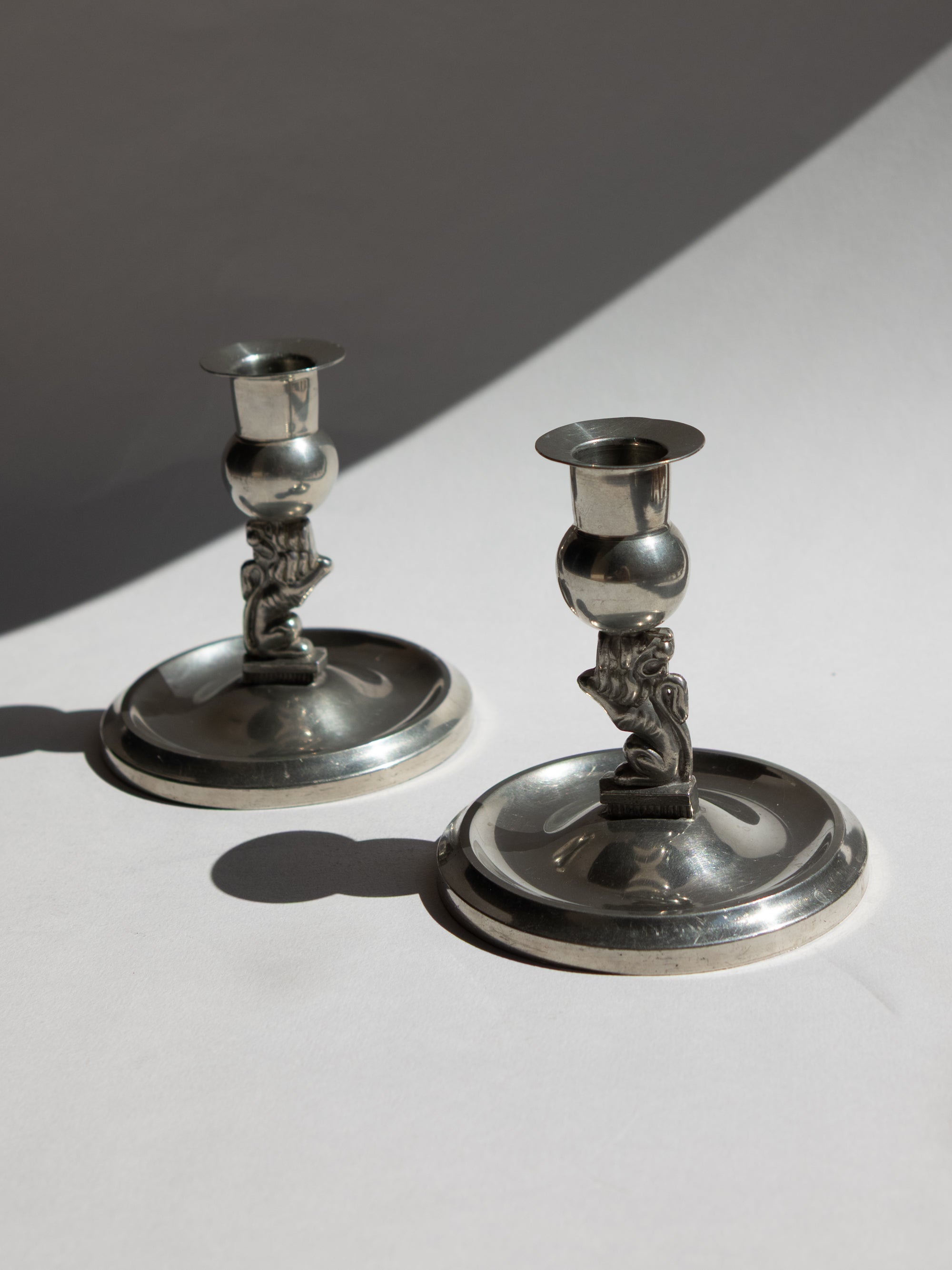 Pair of Swedish Grace Pewter Lion Candlesticks by Eskilstuna Metallindustri (EM) | Svenskt Tenn