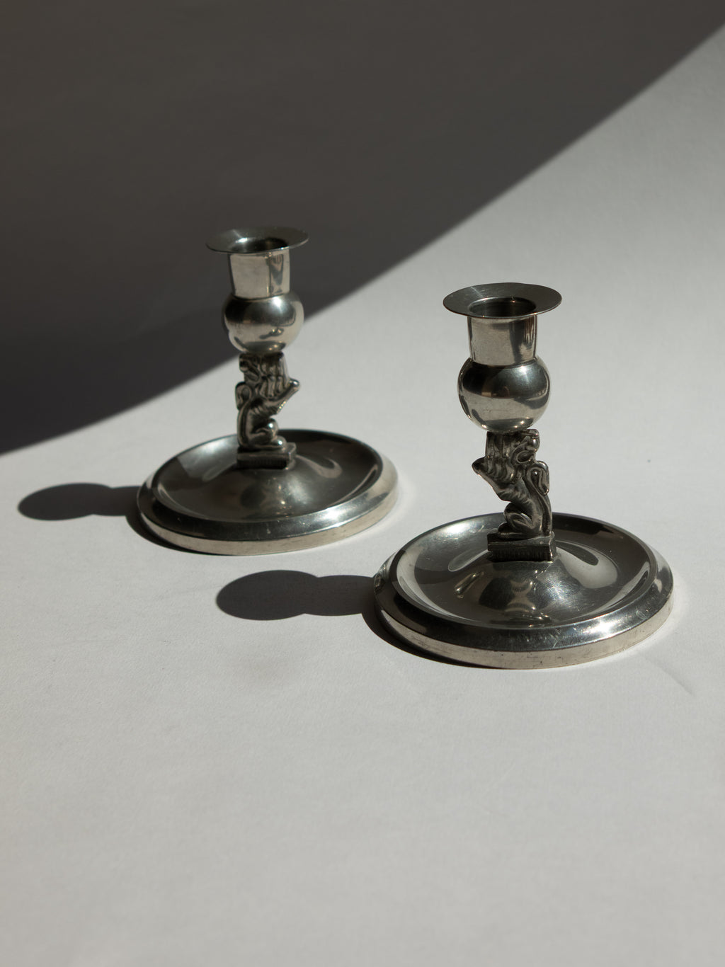 Pair of Swedish Grace Pewter Lion Candlesticks by Eskilstuna Metallindustri (EM) | Svenskt Tenn