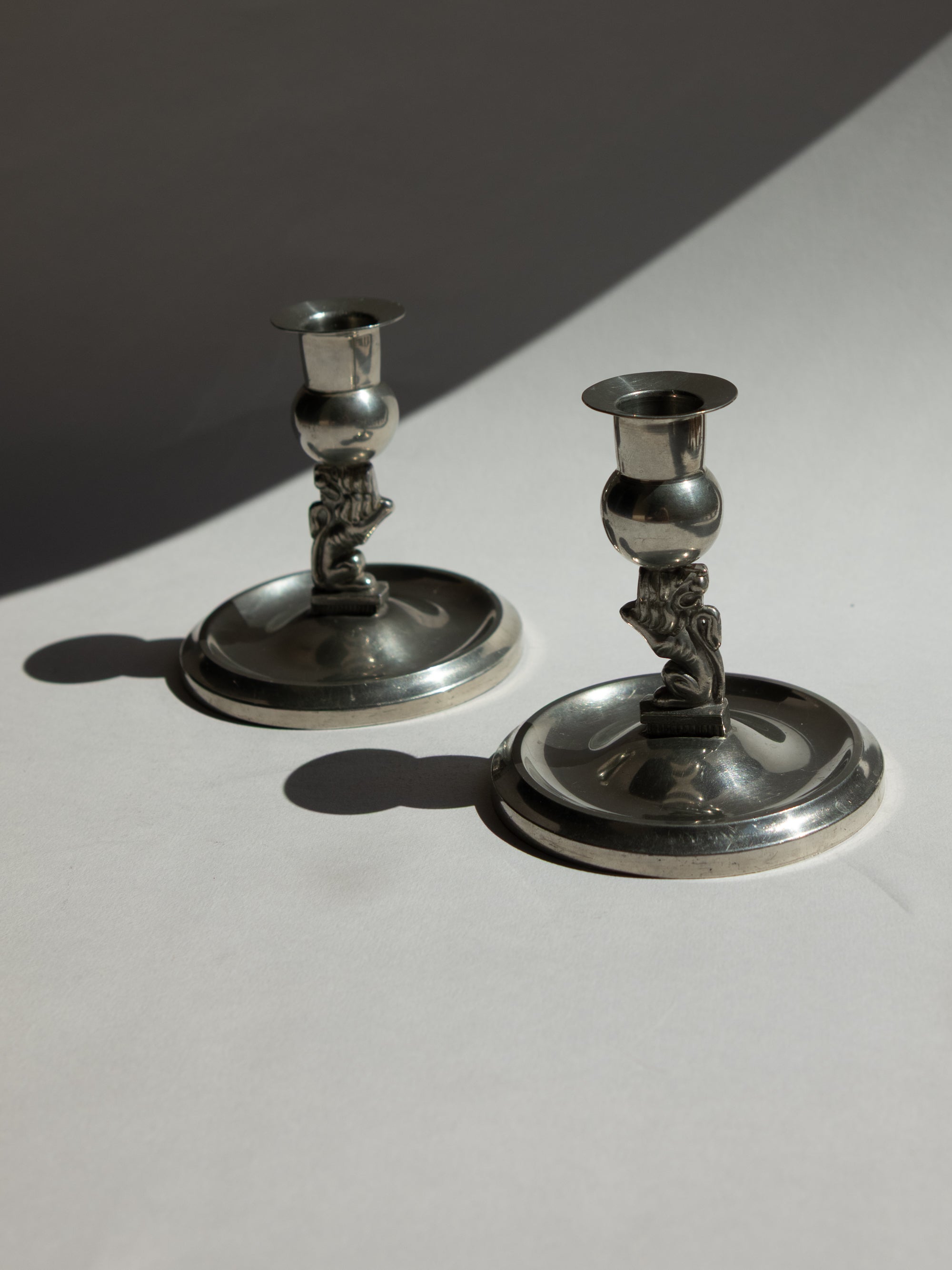 Pair of Swedish Grace Pewter Lion Candlesticks by Eskilstuna Metallindustri (EM) | Svenskt Tenn