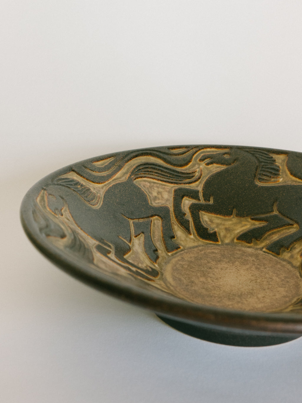 Stoneware Bowl with Galloping Horses in Relief