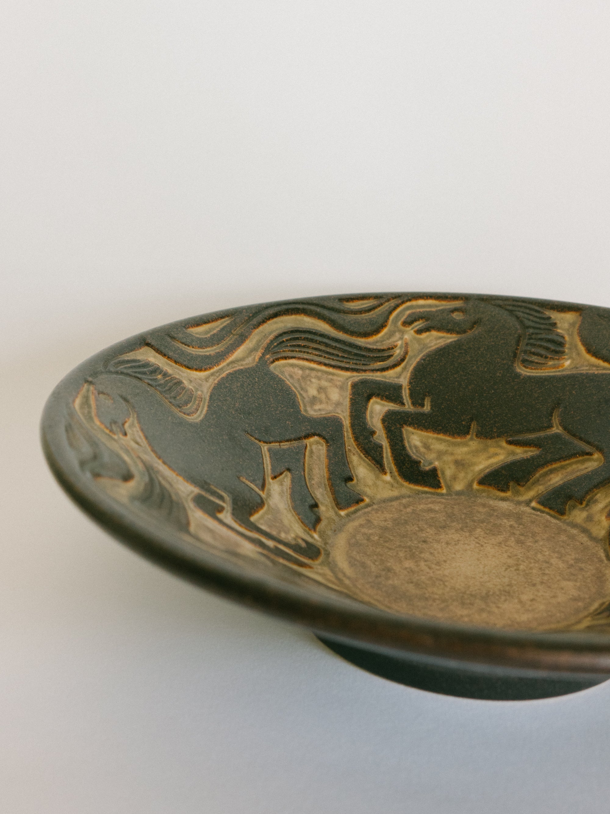 Stoneware Bowl with Galloping Horses in Relief
