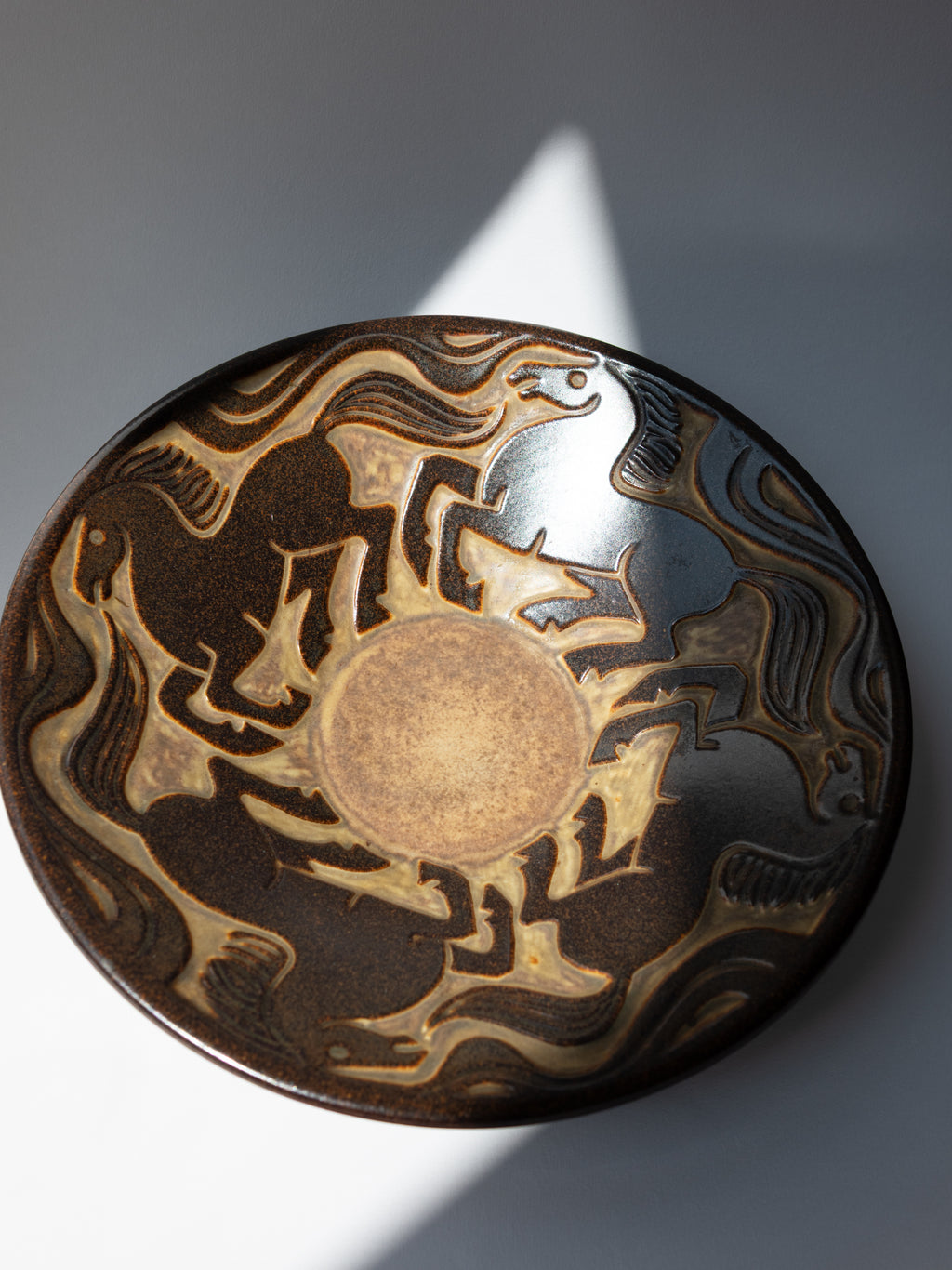 Stoneware Bowl with Galloping Horses in Relief
