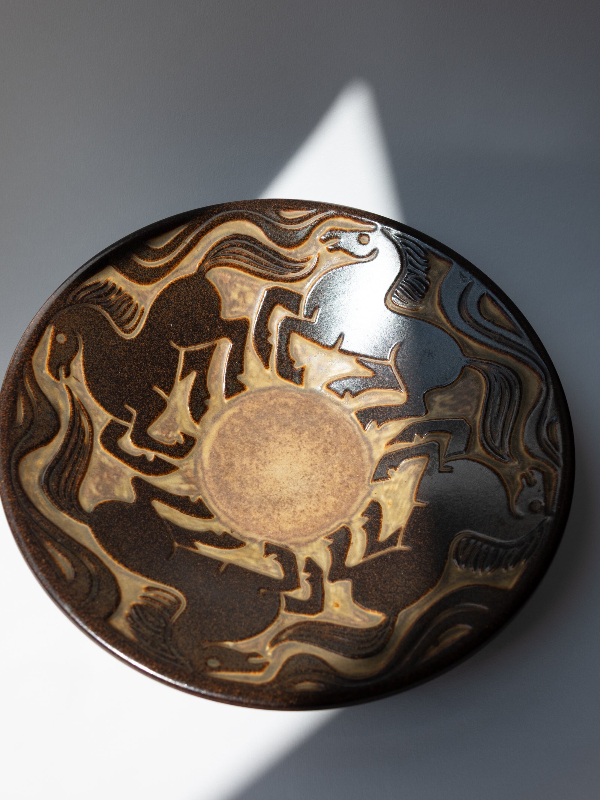 Stoneware Bowl with Galloping Horses in Relief