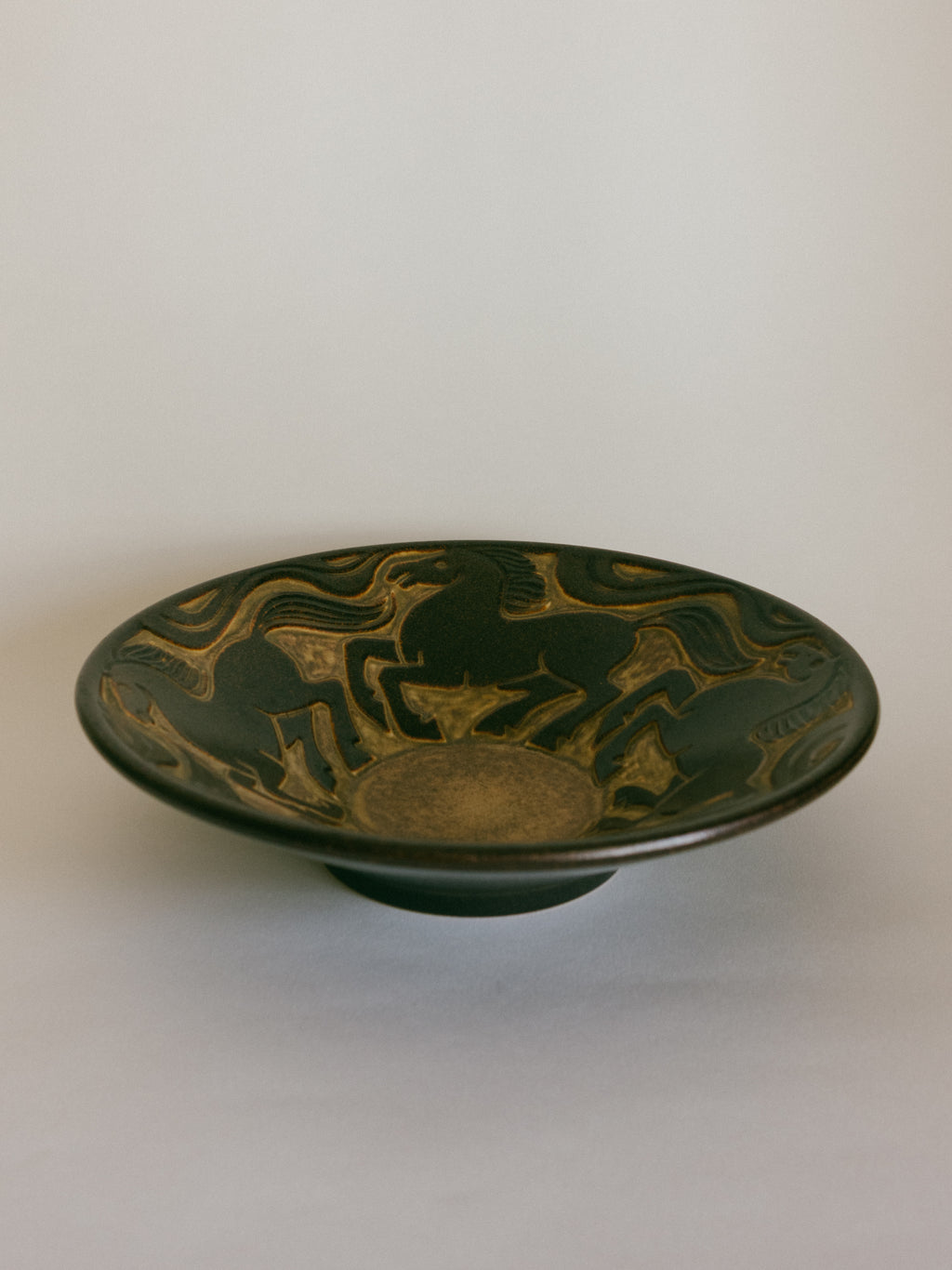 Stoneware Bowl with Galloping Horses in Relief